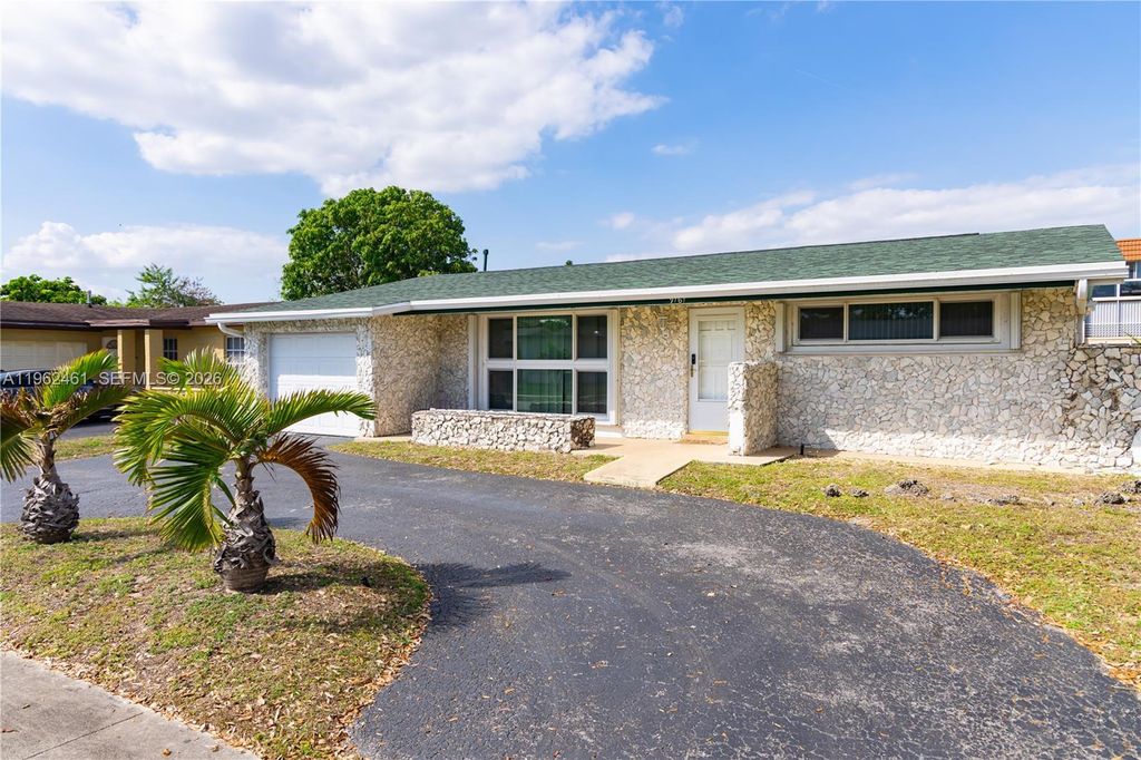 Photo of 9161 NW 26th Pl, Sunrise, FL 33322 (MLS # A11962461)