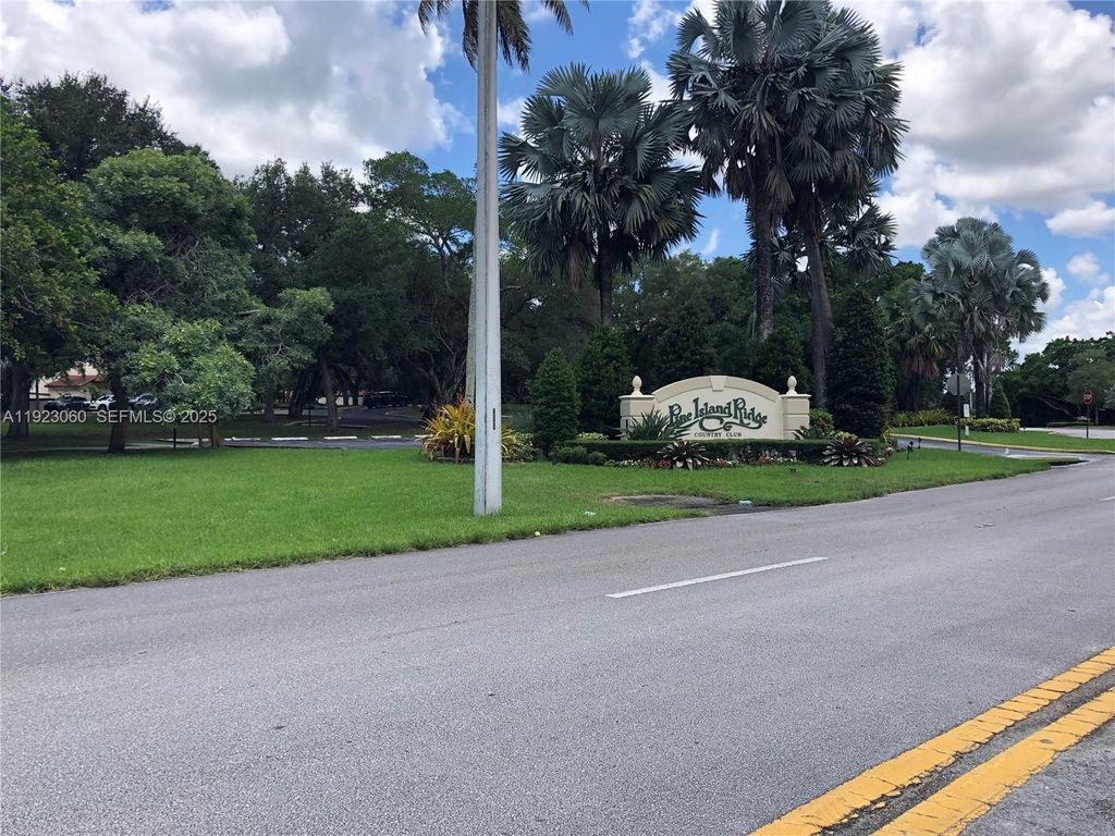 Photo of 9441 Evergreen Pl #301, Davie, FL 33324 (MLS # A11923060)