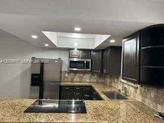 Photo of 6900 SW 39th St #111K, Davie, FL 33314 (MLS # A12033617)