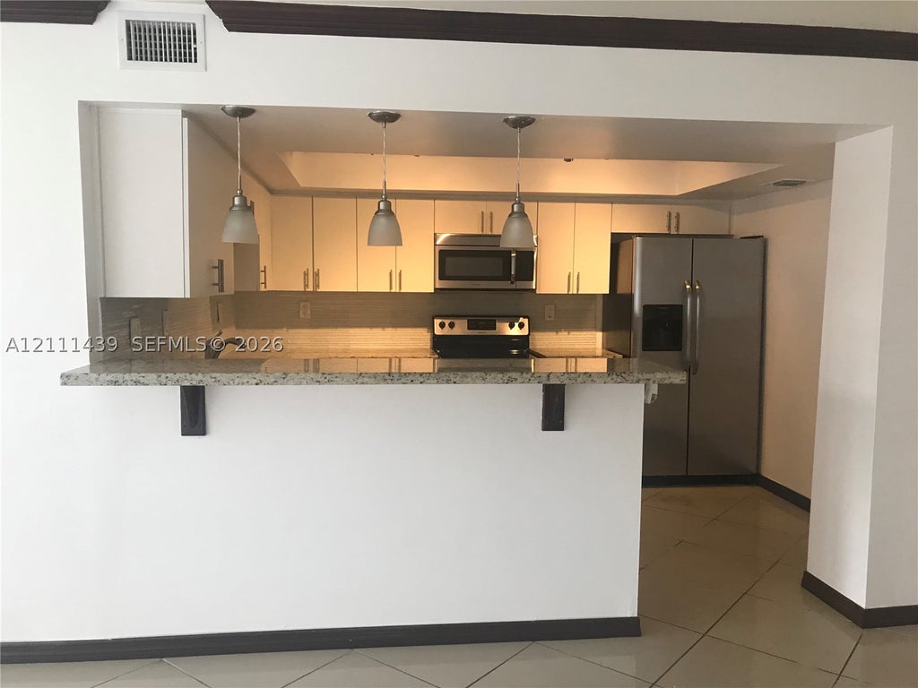 Photo of 800 Parkview Dr #102, Hallandale Beach, FL 33009 (MLS # A12111439)