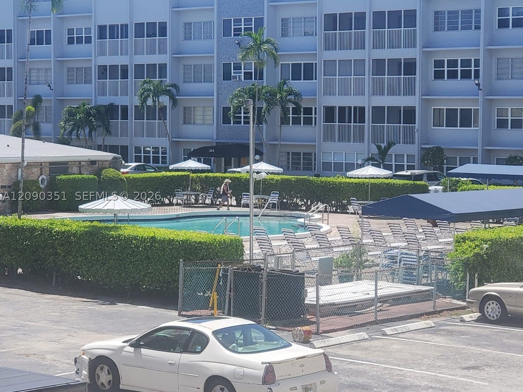 Photo of 215 SE 3rd Ave #206D, Hallandale Beach, FL 33009 (MLS # A12090351)