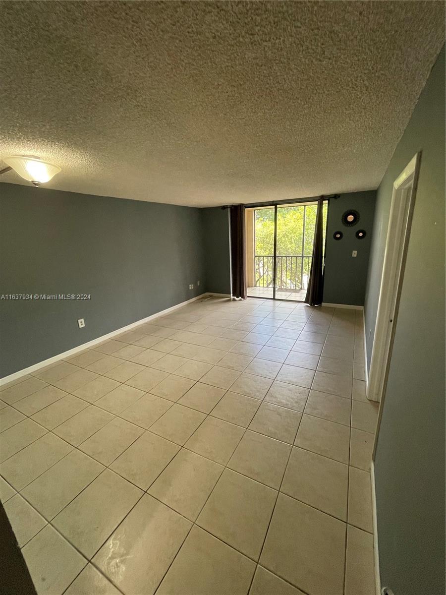Lowest Priced One Bedroom Condo in the Area! Great Location in the heart of Kendall; just minutes away from the Palms at Town and Country, Turnpike, shopping centers, great restaurants, and much more. This unit is a large 1 bedroom/1.5 bathroom in a well maintained gated community. The community offers tennis courts, pools, clubhouse, 24 hour surveilance, lush green areas, and more. This is a must see! The property can be a great home or investment.