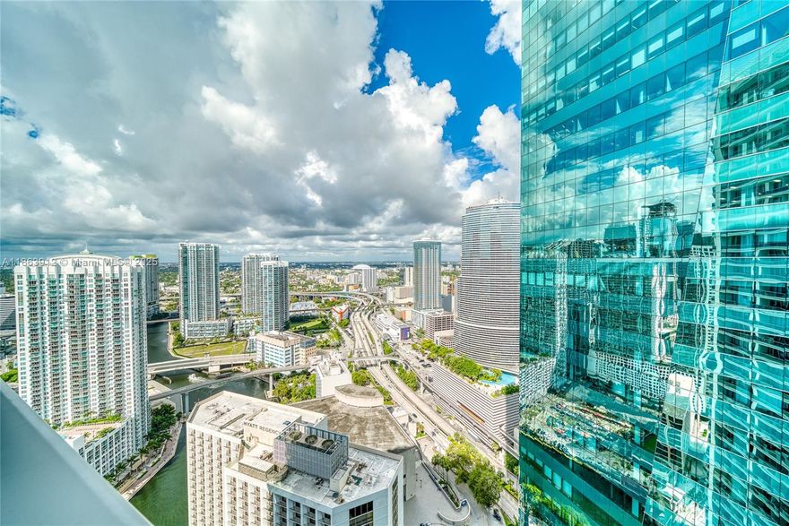 Experience luxury living in this spacious 1 Bedroom, 1.5 Bathroom residence with an open floor plan, soaring 11-foot ceilings, and breathtaking sunset, Miami skyline, and bay views.
The gourmet Snaidero kitchen features Miele & Subzero appliances, perfect for culinary enthusiasts. The spa-like bathroom offers an oversized tub-jacuzzi, rain shower head, and sleek modern finishes.
Residents enjoy premier amenities: 24-hour concierge, valet, security, conference rooms, multiple pools with cabanas, 5-star spa, hotel pools, a state-of-the-art gym, rooftop, and on-site dining.
Ideally located, just steps from supermarkets, Bayside, Bayfront Park, the Arena, museums, the Financial District, and Wynwood. A property video is available on YouTube by searching the address.
