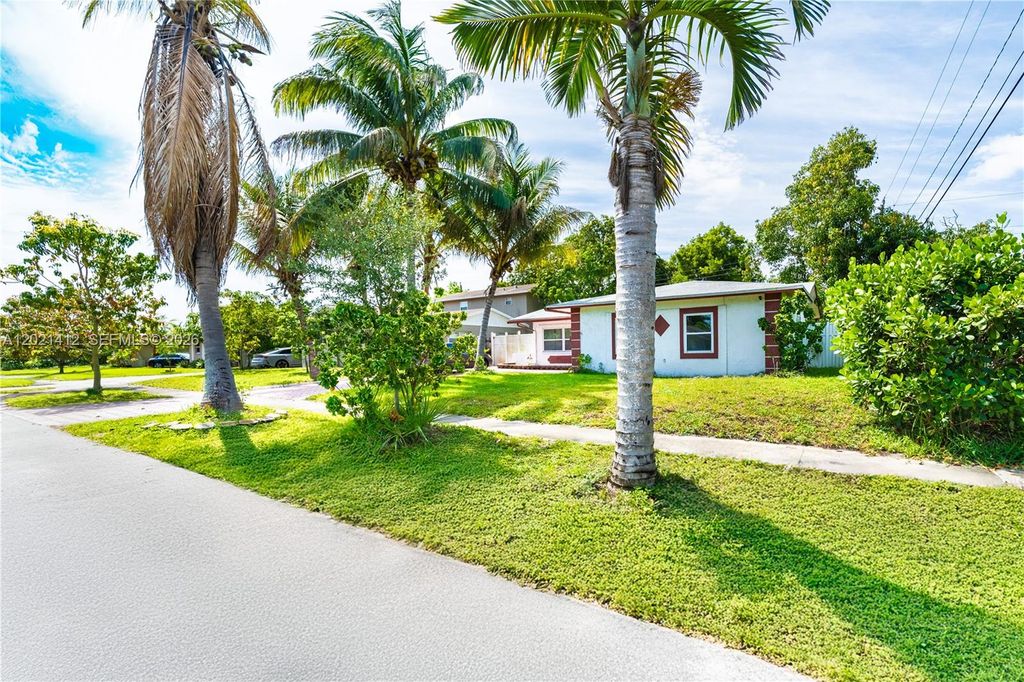 Photo of 4360 NW 32nd Ct, Lauderdale Lakes, FL 33319 (MLS # A12021412)