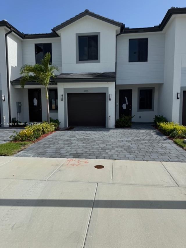READY TO CLOSE, BEAUTIFUL TOWNHOUSE, 3 BEDROOMS AND 2.5 BATHROOMS WITH ONE CAR GARAG, ALL TILED-ON 1ST FLOOR, LAMINATED FLOOR UPSTAIRS, IMPACT DOORS AND WINDOWS, FHA APPROVED, EASY TO SHOW