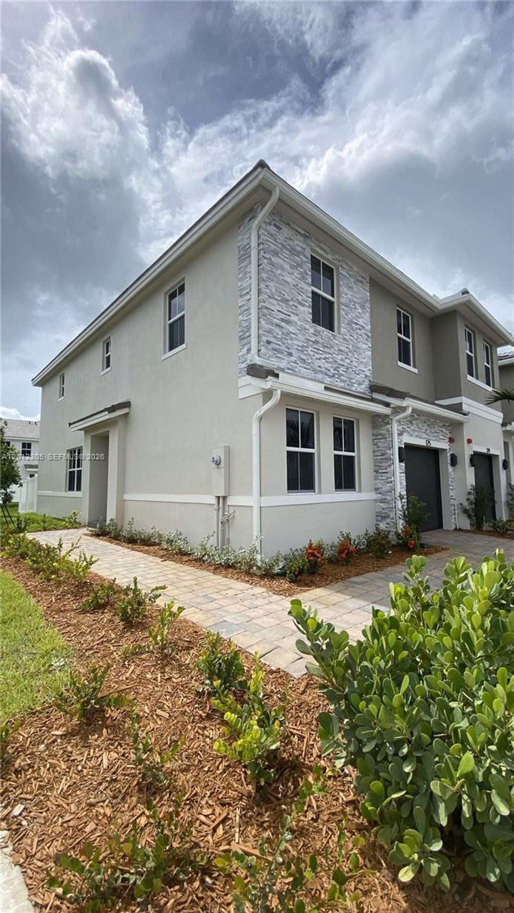 Photo of 125 SW 171st Way #125, Pembroke Pines, FL 33027 (MLS # A12012305)