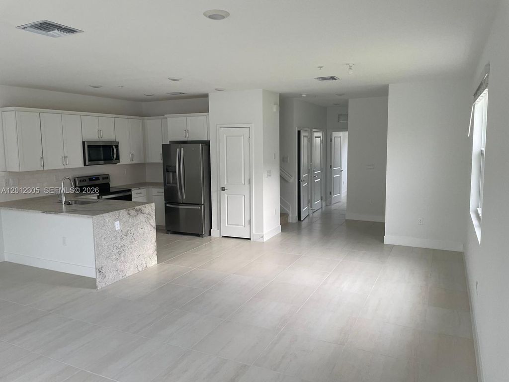 Photo of 125 SW 171st Way #125, Pembroke Pines, FL 33027 (MLS # A12012305)