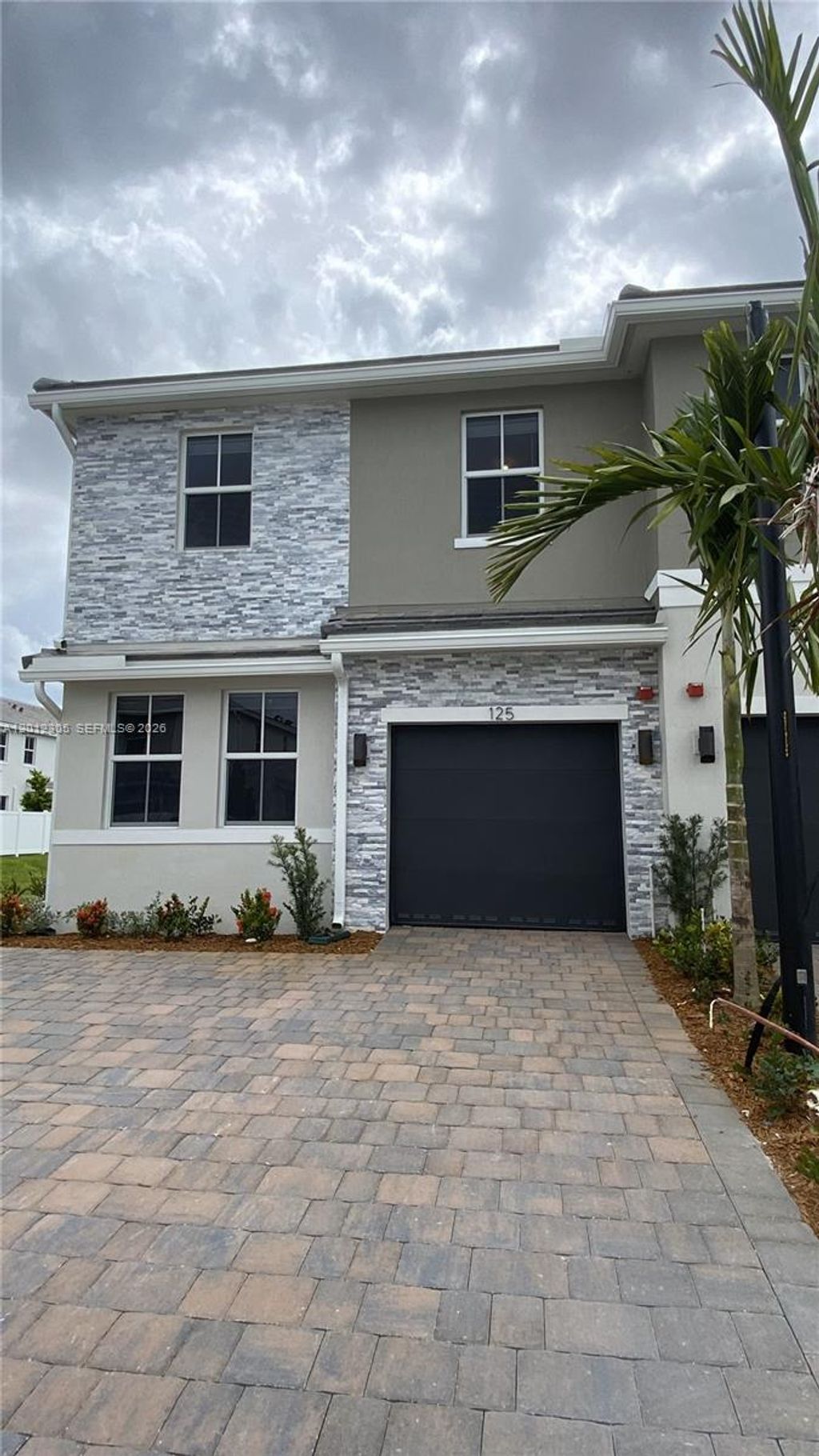 Photo of 125 SW 171st Way #125, Pembroke Pines, FL 33027 (MLS # A12012305)