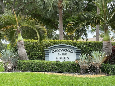 Photo of 9849 Riverside Dr #8-26, Coral Springs, FL 33071 (MLS # A12074167)