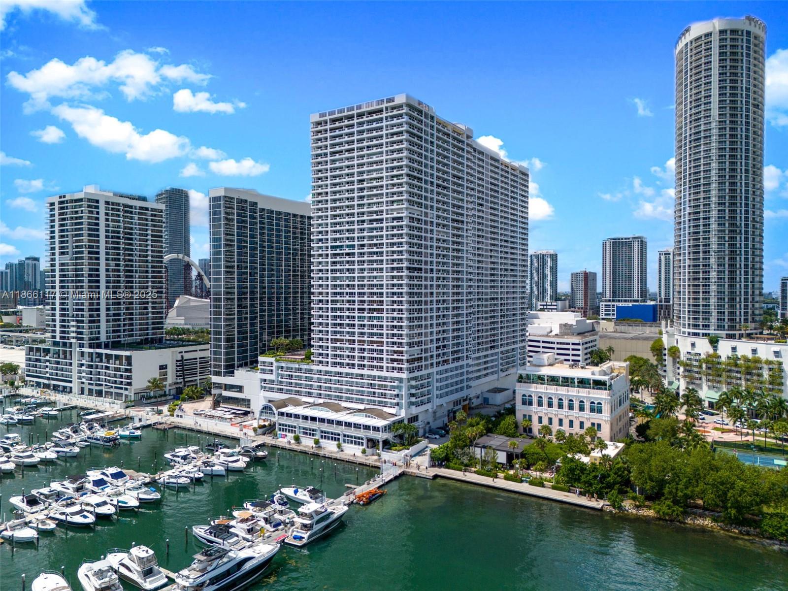 Welcome to The Grand Condominium, where comfort meets convenience in the heart of Miami. This 1-bed, 1.5-bath residence showcases panoramic views of Biscayne Bay and the city skyline from an expansive balcony — an ideal spot to unwind or entertain. Residents at The Grand enjoy a full suite of amenities right at their doorstep, including a resort-style pool, state-of-the-art fitness center, on-site retail, and diverse dining options. With 24-hour concierge and security, peace of mind comes standard. Set within Miami’s vibrant Arts & Entertainment District, you’re steps away from museums, performing arts venues, and sports arenas. Ideal as a primary home or an investment, this condo offers flexible rental options: 30-day minimum leases or daily rentals through the building's hotel program.