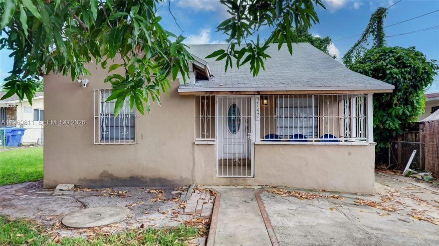 Nice, Gated Single-Family Home with Large back yard with room to build on to house or build pool. House location is close to everything Miami has to offer. Close to Wynwood, Brickell downtown Miami, Beach, MIA airport, House easy to show and ready to move in. No HOA. Equal Hosing opportunity.