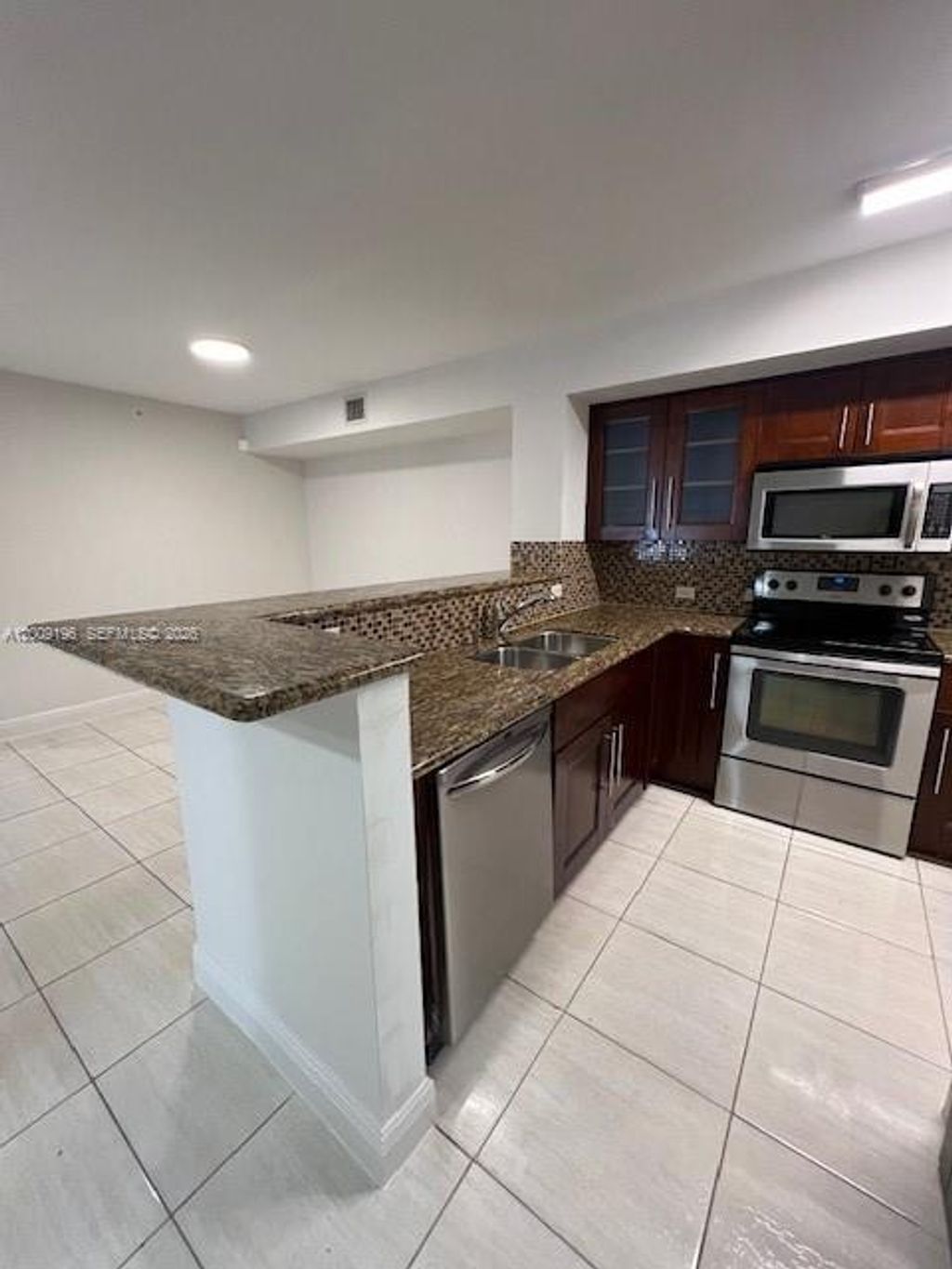 Photo of 520 SW 111th Ave #101, Pembroke Pines, FL 33025 (MLS # A12009196)