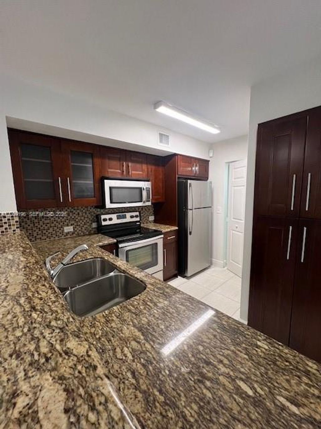 Photo of 520 SW 111th Ave #101, Pembroke Pines, FL 33025 (MLS # A12009196)