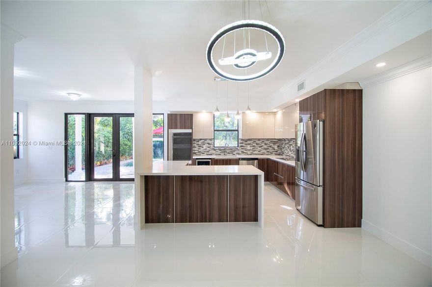 Back on the market! Buyer financing fell apart, their loss is your opportunity! Stunning COCONUT GROVE Home! GORGEOUS home features 5 bedrooms, 4 bathrooms, 2510sf of living space.  Construction area 3,225 SF. The first floor features FULL BEDROOM & BATHROOM, BRAND NEW OPEN KITCHEN, NEW POOL AREA, connected to a covered open terrace w/Outdoor kitchen ( BBQ and sink) Attached one Garage, FULLY REMODELED BATHROOMS, and amazing laundry room w janitor sink. This home also boasts TWO balconies on the second floor. And balcony overlooking the pool area.
Located near a central street, in the highly-coveted Coconut Grove/Coral Gables area, this home is minutes away from most of what Miami has to offer –Call today to schedule an appointment to come see your Miami Dream Home!