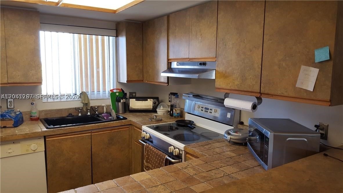 201 NW 7th St 408