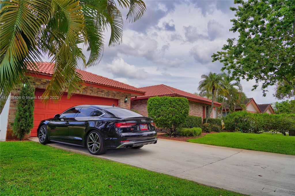 Photo of 7115 NW 42nd Ct, Coral Springs, FL 33065 (MLS # A11368406)