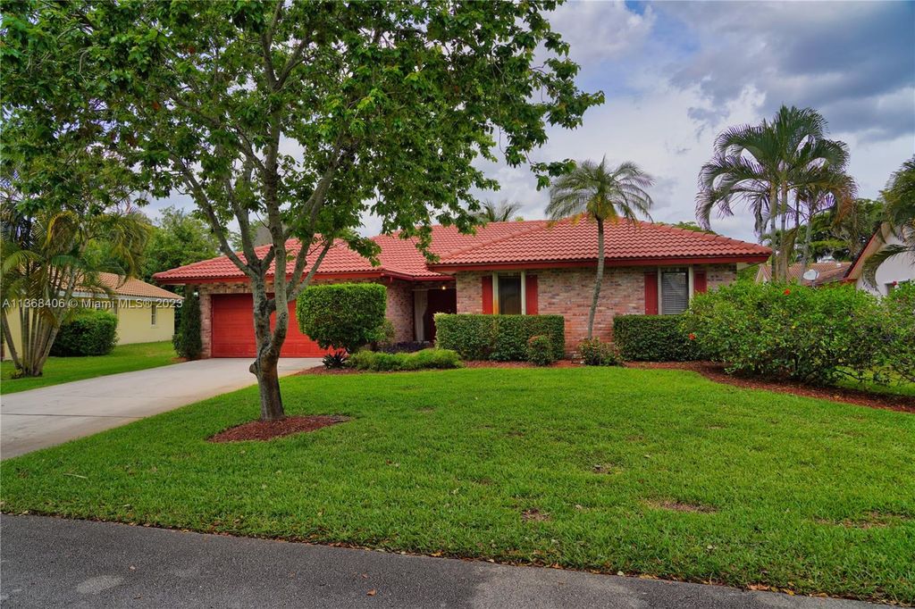 Photo of 7115 NW 42nd Ct, Coral Springs, FL 33065 (MLS # A11368406)