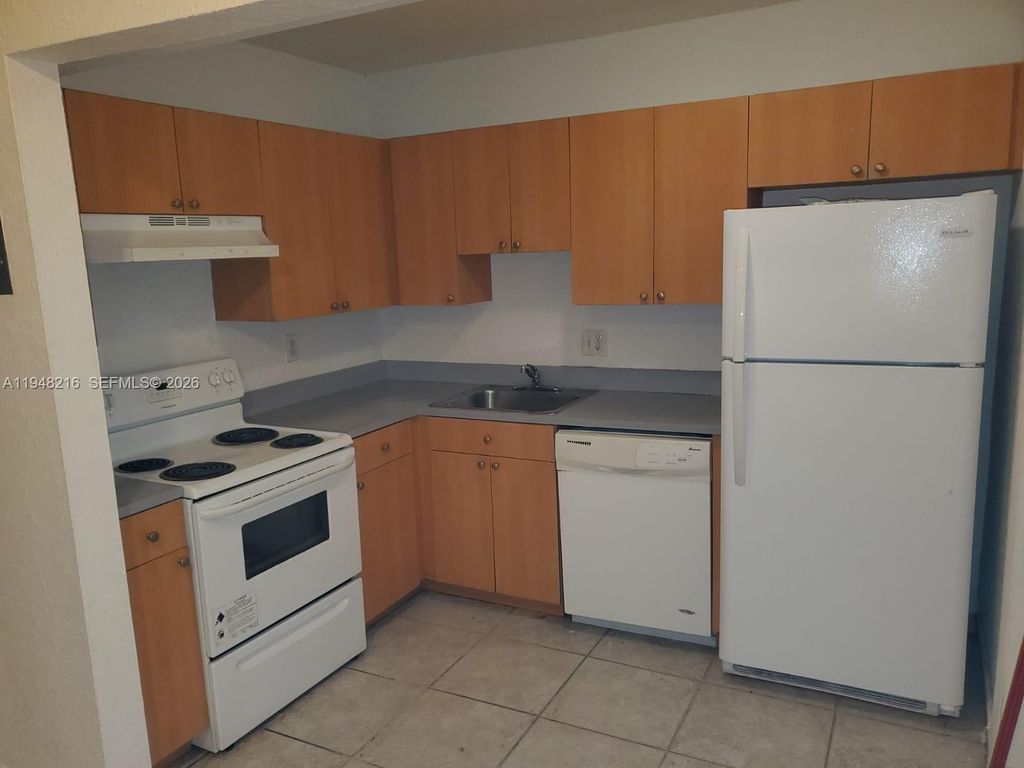 Photo of 4633 NW 9th Dr #4633, Plantation, FL 33317 (MLS # A11948216)
