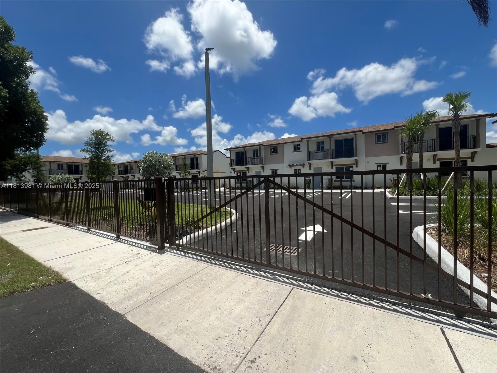 Be the first to live in this spacious 1500 sq ft brand new construction 3 bedroom 2.5 bathroom townhouse. Home offers beautiful upgrades such as stainless steal appliances, 20 x 20 porcelain tiles (NO RUGS), solid surfaces counter top along with washer/dryer. Mins away from shopping, Florida Keys, farmers market and more. All bedrooms located on the 2nd flr. This is a gated community. Call/Txt agent for showing instructions.. Section 8 ok!