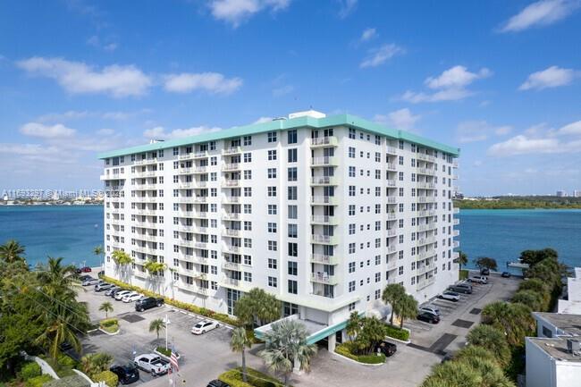 Beautiful Bay Harbor Islands only blocks away from the beach and Bal Harbor Shops and A+ school.
CORNER WATER FRONT unit with direct incredible views of the bay.
1330 sq ft of ample living space in this split 2 bedroom 2 bathroom unit. Porcelain floors, all newly painted, new Bosch washer and dryer and new fridge. Two parking spaces (1 garaged) and storage unit. Internet and cable included in HOA.
Amenities: Heated pool, tiki huts, gas grills, gym, media room, pool table and 24 hrs. front desk.