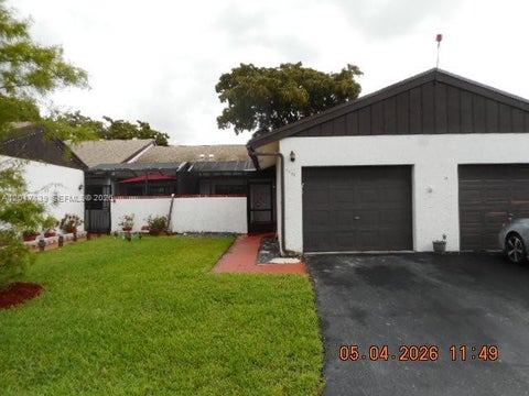 Photo of 6388 E Pinehurst Cir E #C30, Tamarac, FL 33321 (MLS # A12017139)