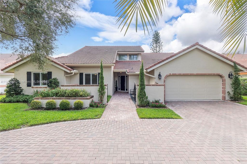 Photo of 5461 NW 86th Ter, Coral Springs, FL 33067 (MLS # A11424643)