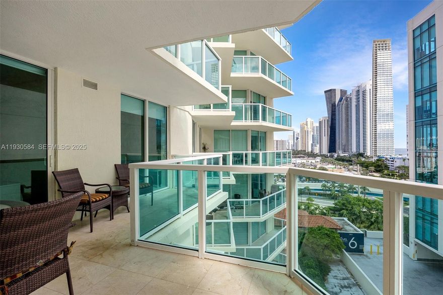 Enjoy elevated coastal living on prestigious Collins Avenue in this elegant 3-bedroom, 2-bath residence with partial ocean, intracoastal, and city views. The well-designed open-concept layout is ideal for everyday living and entertaining, flowing seamlessly to a spacious wrap-around balcony—perfect for relaxing or hosting guests.

The open kitchen connects beautifully to the living area, making cooking and gathering effortless. The primary suite offers a comfortable retreat with a walk-in closet and en-suite bath. Additional features include impact glass windows and an in-unit washer and dryer for added convenience.

Residents enjoy unlimited beach access with full-service beach amenities, catered by a neighboring luxury hotel, delivering a true resort-style lifestyle. The building also offers a fitness center, spa, swimming pool, clubhouse, and 24-hour valet, concierge, and security services. One assigned parking space plus valet included.

Ideally located one block from the ocean, with canal access, a pedestrian promenade, parks, dining, and shops just steps away—an exceptional opportunity to own in Sunny Isles Beach. One of the best-priced 3-bedroom residences along Collins Avenue, offering outstanding value for beachfront living.