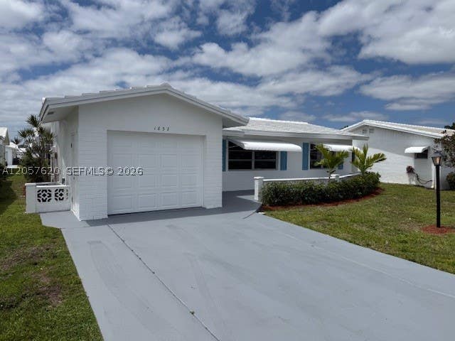 Photo of 1832 SW 17th St, Boynton Beach, FL 33426 (MLS # A12057620)