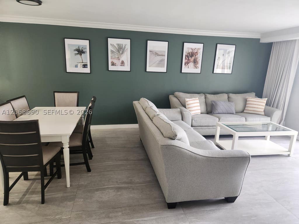 Photo of 100 Golden Isles Dr #409, Hallandale Beach, FL 33009 (MLS # A12068690)
