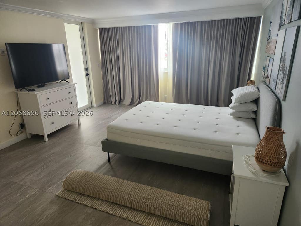 Photo of 100 Golden Isles Dr #409, Hallandale Beach, FL 33009 (MLS # A12068690)