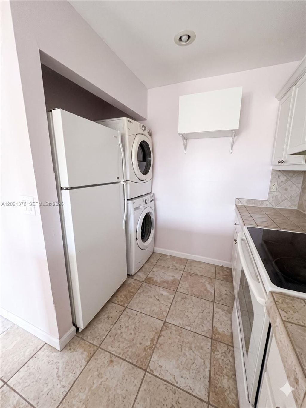 Photo of 10046 Winding Lake Rd #204, Sunrise, FL 33351 (MLS # A12021376)
