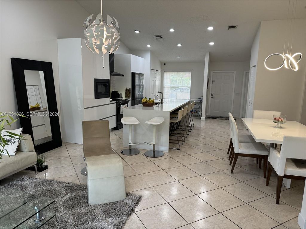 Photo of 2002 Andromeda Ln, Weston, FL 33327 (MLS # A11991826)