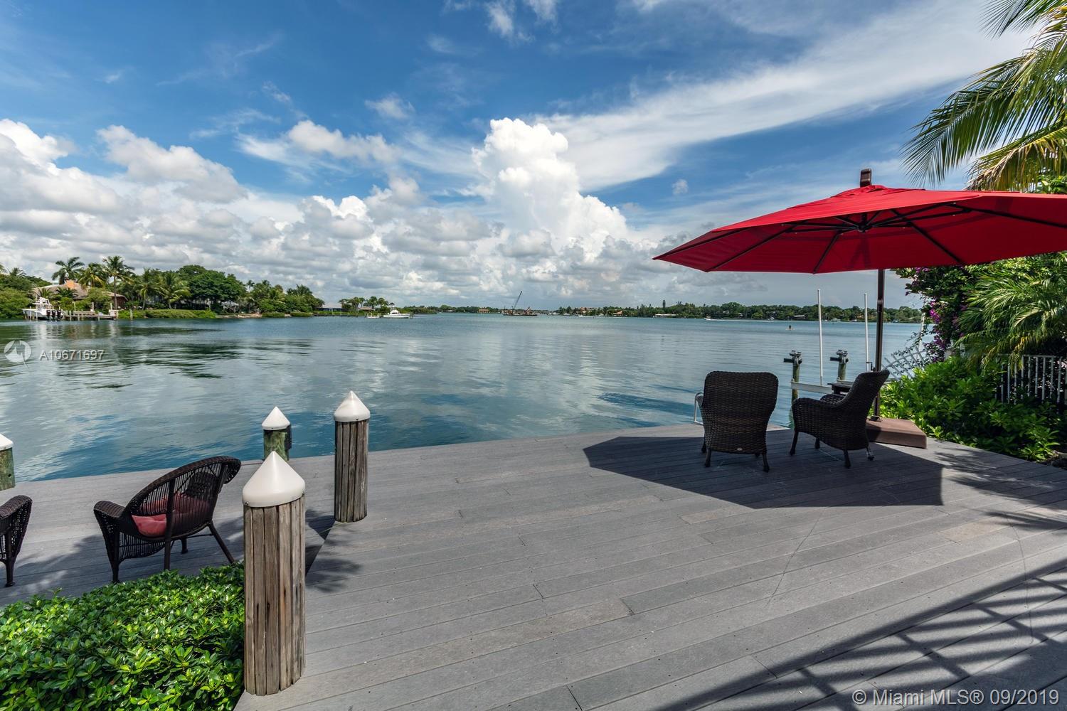 private enclave , only 8 private residences , sellers have all ready relocated , house is vacant an easy to show at a seconds notice , located on the most desireable location on the loxahatchee river , breath taking views and majestic sunsets , minutes to the jupiter inlet, watch the incoming crystal blue tide , homes do not last long when offered for sale in lands end. NEW 24 K POUND BOAT LIFT.