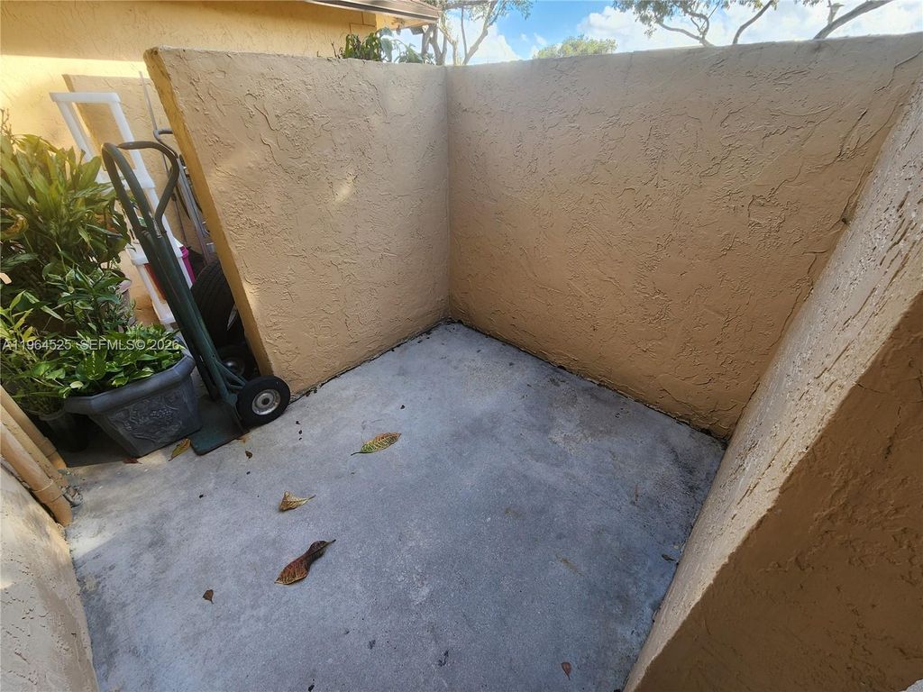 Photo of 10967 NW 30th Pl #A, Sunrise, FL 33322 (MLS # A11964525)