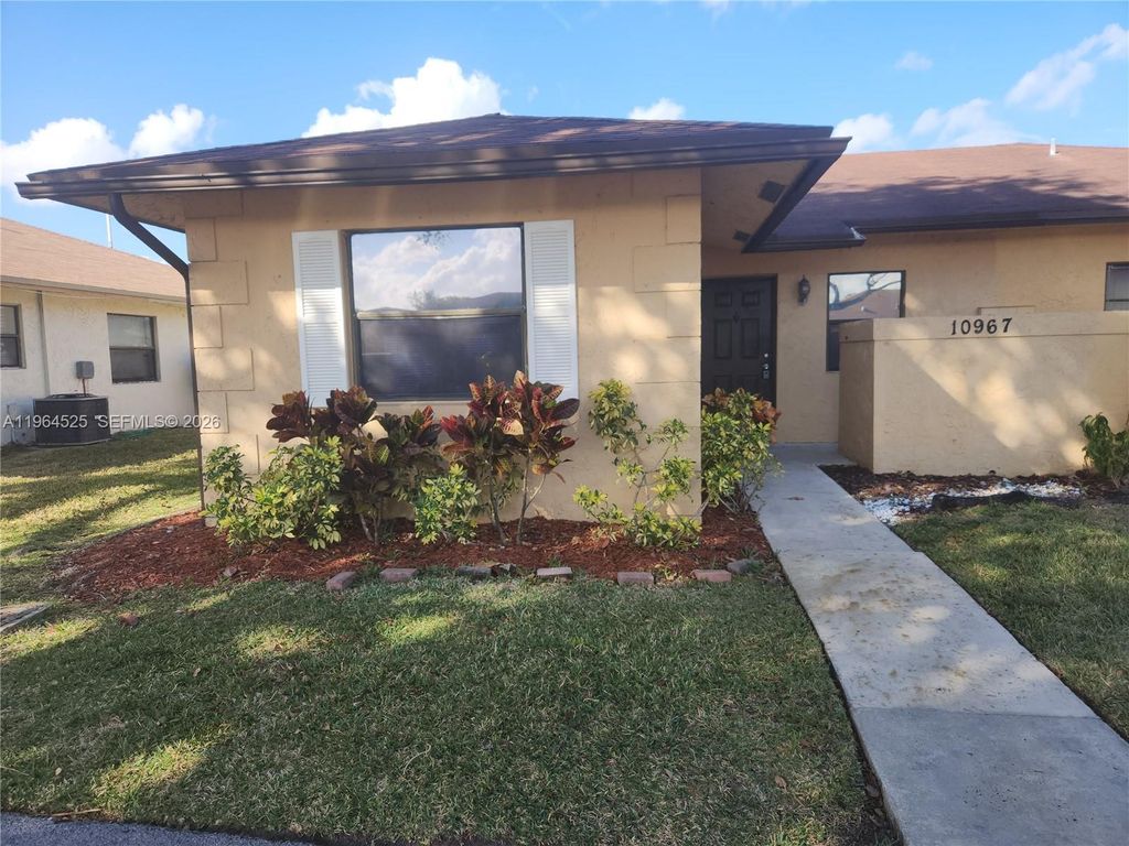 Photo of 10967 NW 30th Pl #A, Sunrise, FL 33322 (MLS # A11964525)