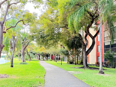 Photo of 2206 S Cypress Bend Dr #508, Pompano Beach, FL 33069 (MLS # A11952552)