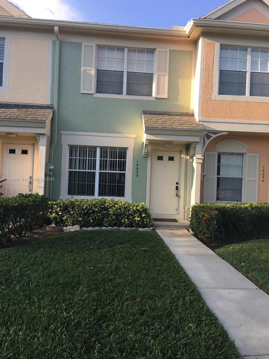 Welcome to Coconuts at Bonaventure. Beautiful and well maintained 2 story townhouse with 2 Beds, 2 1/2 Baths. This Townhome offering two spacious bedrooms each with en-suite bathrooms and a first floor a half bath. Kitchen with Stainless Steel Appliances. Enjoy the screened porch with a large storage room. Accordion Hurricane Shutters. 2018 AC. 2023 Water Heater. Low Association Fee included Cable TV, Trash, Landscaping. Clubhouse Membership of $365/yr. Parking is directly in front of your home and there is plenty of guest parking. THIS IS THE LOWEST PRICE FOR 2 BEDS AND 2 1/2 BATHS IN THIS COMMUNITY.