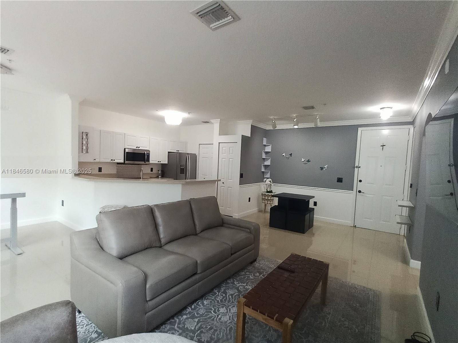 Beautiful remodeled furnished 1 bed/1 bath upgraded with light cream color porcelain flooring throughout the entire unit. Large impact windows and amazing exposure to the east providing plenty of natural light. Remodeled kitchen with stainless steel appliances, integrated kitchen layout with living and dining area provides great entertaining space when hosting guests. Washer & Dryer in the unit. Clubhouse w/pool, fitness center, indoor basketball half court, conference room, billiard room, children's playground area, patio tables, volleyball net & sand. Beautiful walking path around the lake. Minutes away from The Shops at Pembroke Gardens, great restaurants, A+ schools & much more. Easily accessible from I-75 with close access to the Turnpike.
