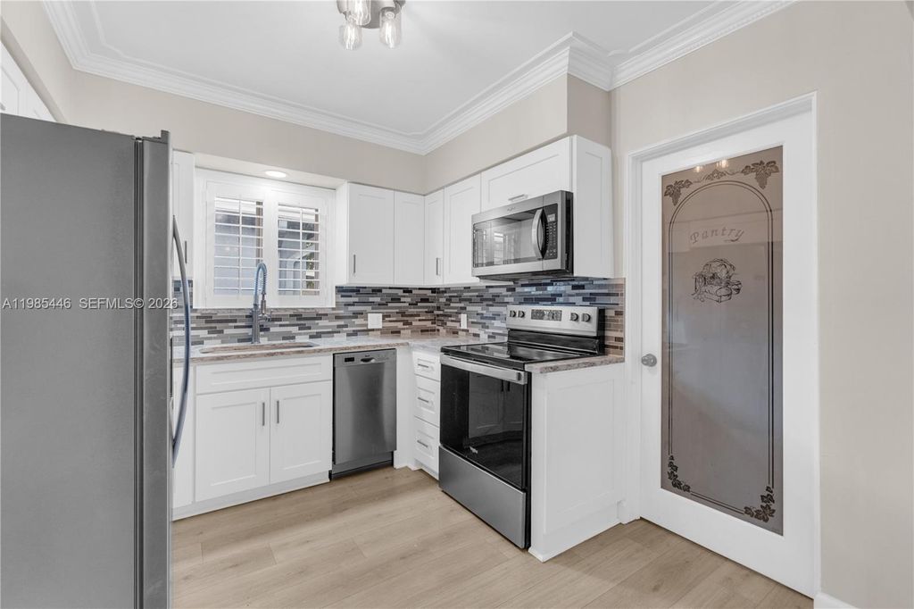 Photo of 211 SE 1st Ter, Dania Beach, FL 33004 (MLS # A11985446)