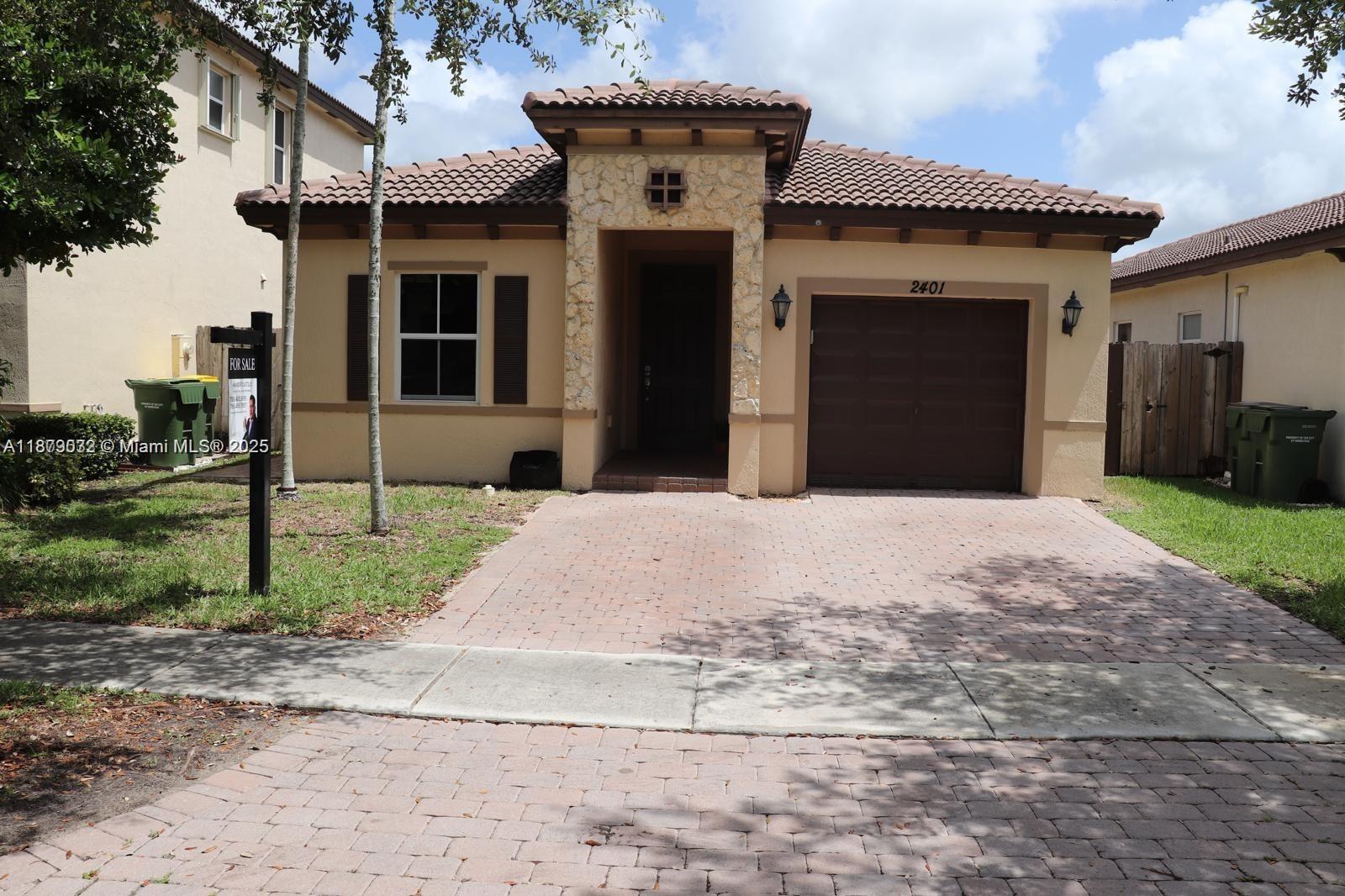 Beautiful 3-bedroom, 2-bath single-family home located in the sought-after community of Atlantis at Oasis in Homestead. Built in 2013, this residence offers 1,400 sq ft of comfortable living space with ceramic and laminate flooring, a bright family room, Florida room, and a converted garage that adds versatility for an office, gym, or playroom. The primary suite features dual bathrooms with shower and tub. Enjoy outdoor living with a fenced backyard, exterior lighting, and hurricane shutters for peace of mind. The community offers a clubhouse, pool, and security, all with a low HOA of just $125/month. Conveniently located near top schools, shopping, dining, and major highways. A wonderful place to call home!