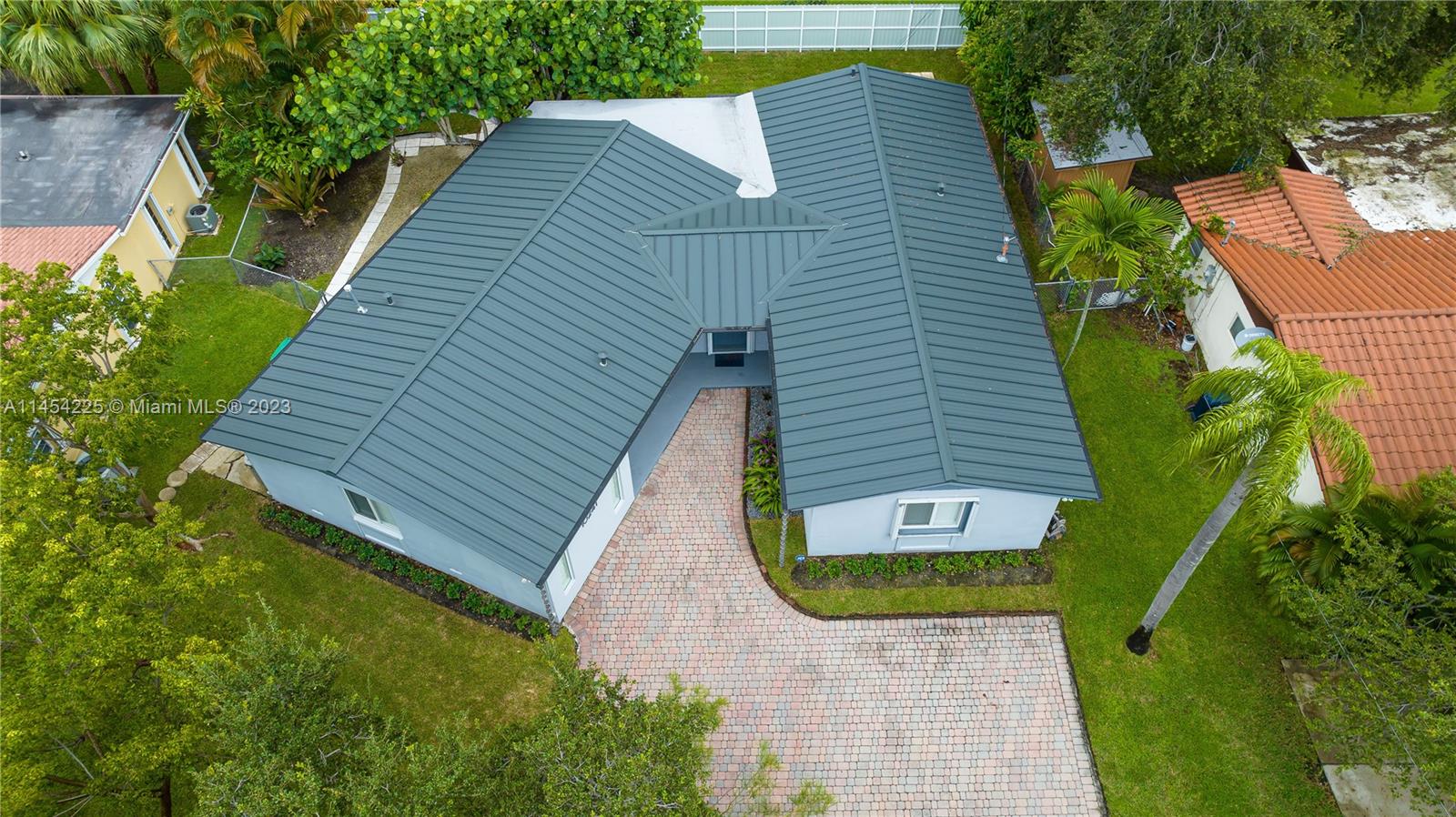 PLS USE SHOW ASSIST TO SCHEDULE APPT - One story house in heart of Westchester. This 3/2 + enclosed garage (office/den) has over 2000 sq ft under METAL ROOF on fenced-in 7600 lot. "A" public school district, private & charter schools & ideal for FIU staffers. Impact & accordian panels on doors & windows, gas range & gas water heater, new refrigerator, newer AC. Home is tiled throughout and in excellent condition. Monthly rent INCLUDES: lawn care, water and professional cameras/alarm monitoring. If you are a discerning tenant with 650+ credit & solid employment, this is it! Two months security + first month, full background check for all 18+ adults.