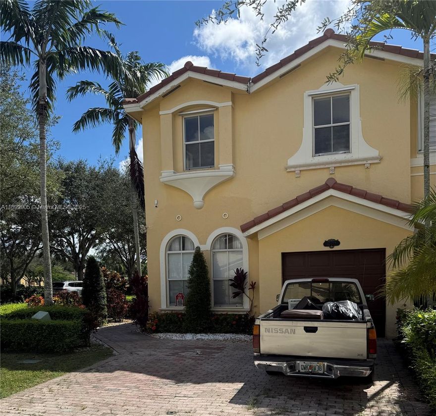 Spacious 4 bedroom, 3 bathroom corner townhome in the desirable Grand Lakes community. Conveniently located near FIU, expressways, shopping, and dining, this home features one bedroom and full bath on the first floor, a large primary suite with double-door entry, sitting area, and walk-in closet, as well as a spacious upstairs landing and laundry room. The interior includes ceramic tile floors downstairs and laminate upstairs, plus a private fenced patio with pavers. Residents enjoy access to excellent amenities including a clubhouse with fitness center, pool, playground, basketball and tennis courts, and plenty of guest parking.