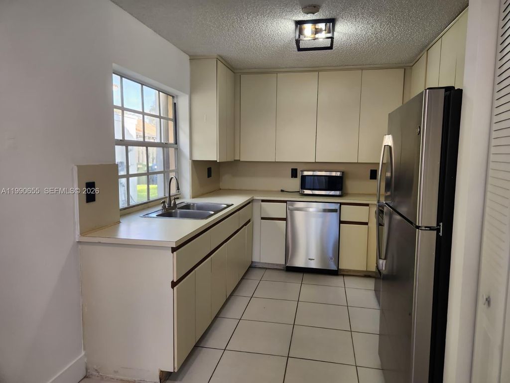 Photo of 1365 Springside Dr #1365, Weston, FL 33326 (MLS # A11990655)