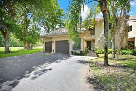 Photo of 16379 Malibu Dr #50, Weston, FL 33326 (MLS # A12046137)