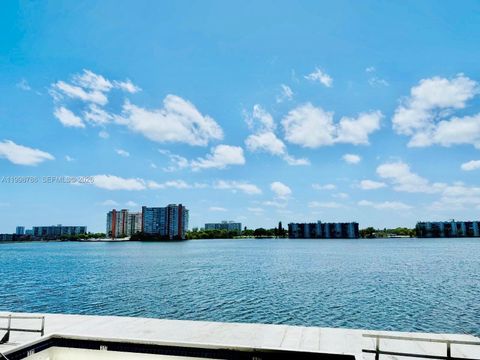 Photo of 1150 NE 191st St #38, Miami, FL 33179 (MLS # A11998786)