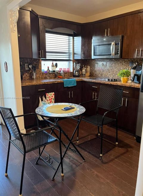 Photo of 9360 Sunrise Lakes Blvd #302, Sunrise, FL 33322 (MLS # A11914625)