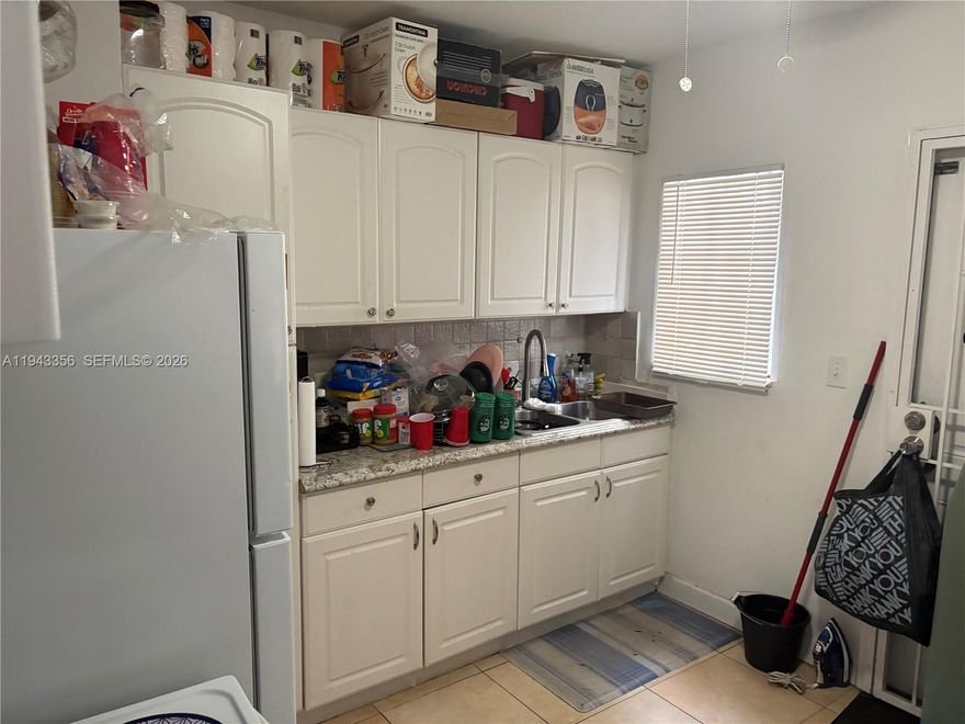 Cozy 2/1 home. Tiled throughout. Impact windows Fenced.  No HOA. Spacious backyard with a storage shed. Close to Wynwood and Brickell.