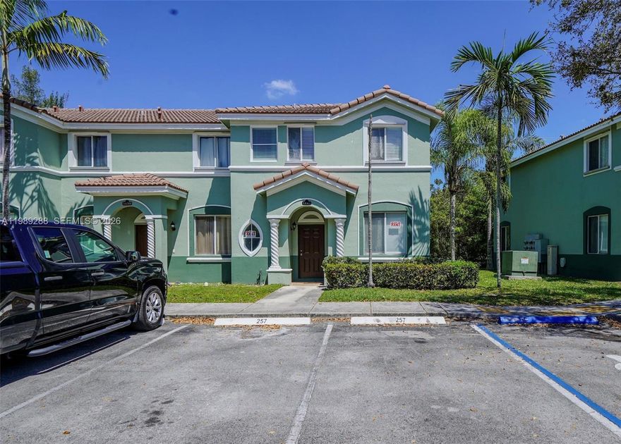 Spacious two story corner townhouse with 3 bedrooms and 3 bathrooms. Features tile floors downstairs, carpet upstairs, stainless steel appliances in the kitchen area, washer and dryer hookups only, walk-in closet, and fresh paint. Enjoy resort style amenities including clubhouse, pools, fitness center, playground, jogging trail, and 24-hour security. Two parking spaces. Conveniently located near the Turnpike, shopping, dining, and Homestead High School. Easy to show!