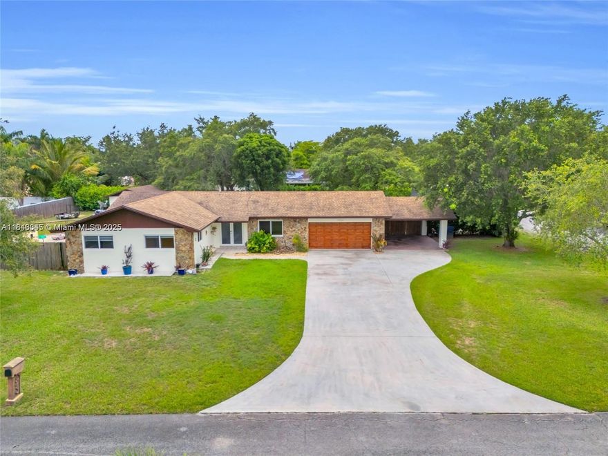 Welcome to this stunning corner-lot home in the Redlands, set on over 21,000 sq ft with plenty of room for a pool, boat, or RV. Step inside to a modern open layout featuring an updated kitchen with granite countertops, stainless steel appliances, sleek cabinetry, and a deep sink overlooking the backyard oasis. Elegant travertine floors flow throughout, complemented by zebra blinds and abundant natural light. Perfect for entertaining, this home offers a spacious 2-car garage, plus a covered carport, and a screened-in patio ideal for outdoor dining or relaxing with a TV. A detached, air-conditioned structure adds versatility — perfect for a gym, office, or guest retreat. Easy to show!