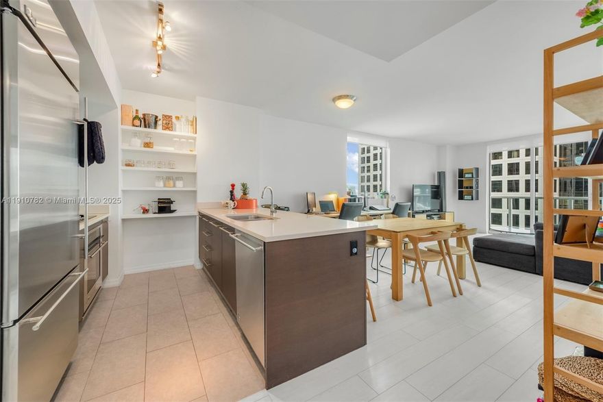 An exquisitely designed 2 Bed/2 Bath corner unit at 500 Brickell West w/ 1,200 interior sq ft, WPC vinyl flooring throughout main living areas, built-in closet cabinetry, roller shades on all windows, s/s kitchen appliances, kitchen pantry, kitchen island w/ Quartz countertop, Jacuzzi tub & separate glass-enclosed shower in master bathroom, walk-in closet in master bedroom, and floor-to-ceiling glass windows w/ views of the bay & river from the 26th floor. Includes one (1) assigned parking space. Building amenities include 42nd-floor rooftop pool & sundeck, 11th-floor infinity-edged pool and poolside cabanas, His & Hers sauna and steam room, hot tub, club rooms, concierge, 24-hr valet parking, fitness center & more. Tenant occupied through March 31, 2026.